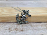 Anchor and skull glow-in-the-dark necklace Edgy maritime jewelry Glow pendant with anchor and skull design Unique nautical accessory Skull - Pink Horse Florida