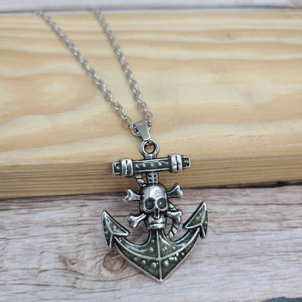 Anchor and skull glow-in-the-dark necklace Edgy maritime jewelry Glow pendant with anchor and skull design Unique nautical accessory Skull - Pink Horse Florida