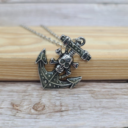Anchor and skull glow-in-the-dark necklace Edgy maritime jewelry Glow pendant with anchor and skull design Unique nautical accessory Skull - Pink Horse Florida