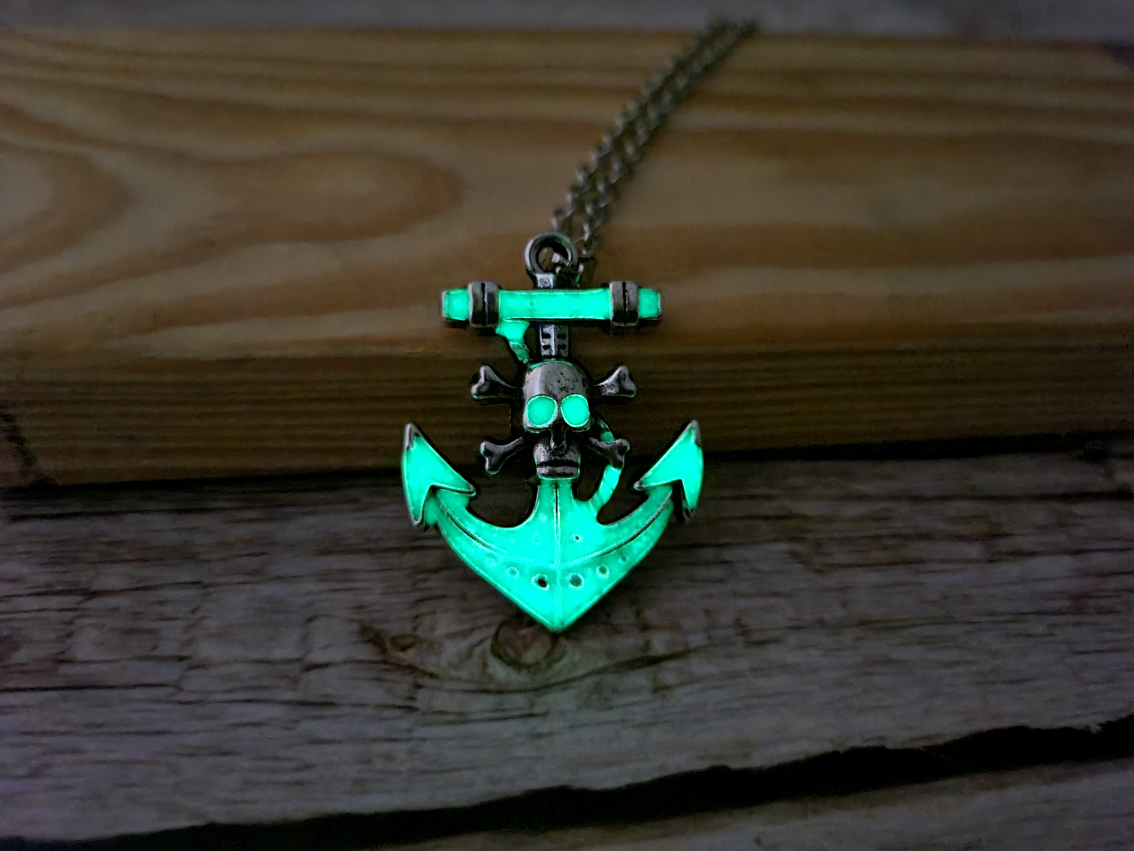 Anchor and skull glow-in-the-dark necklace Edgy maritime jewelry Glow pendant with anchor and skull design Unique nautical accessory Skull - Pink Horse Florida