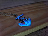 Anchor and skull glow-in-the-dark necklace Edgy maritime jewelry Glow pendant with anchor and skull design Unique nautical accessory Skull - Pink Horse Florida