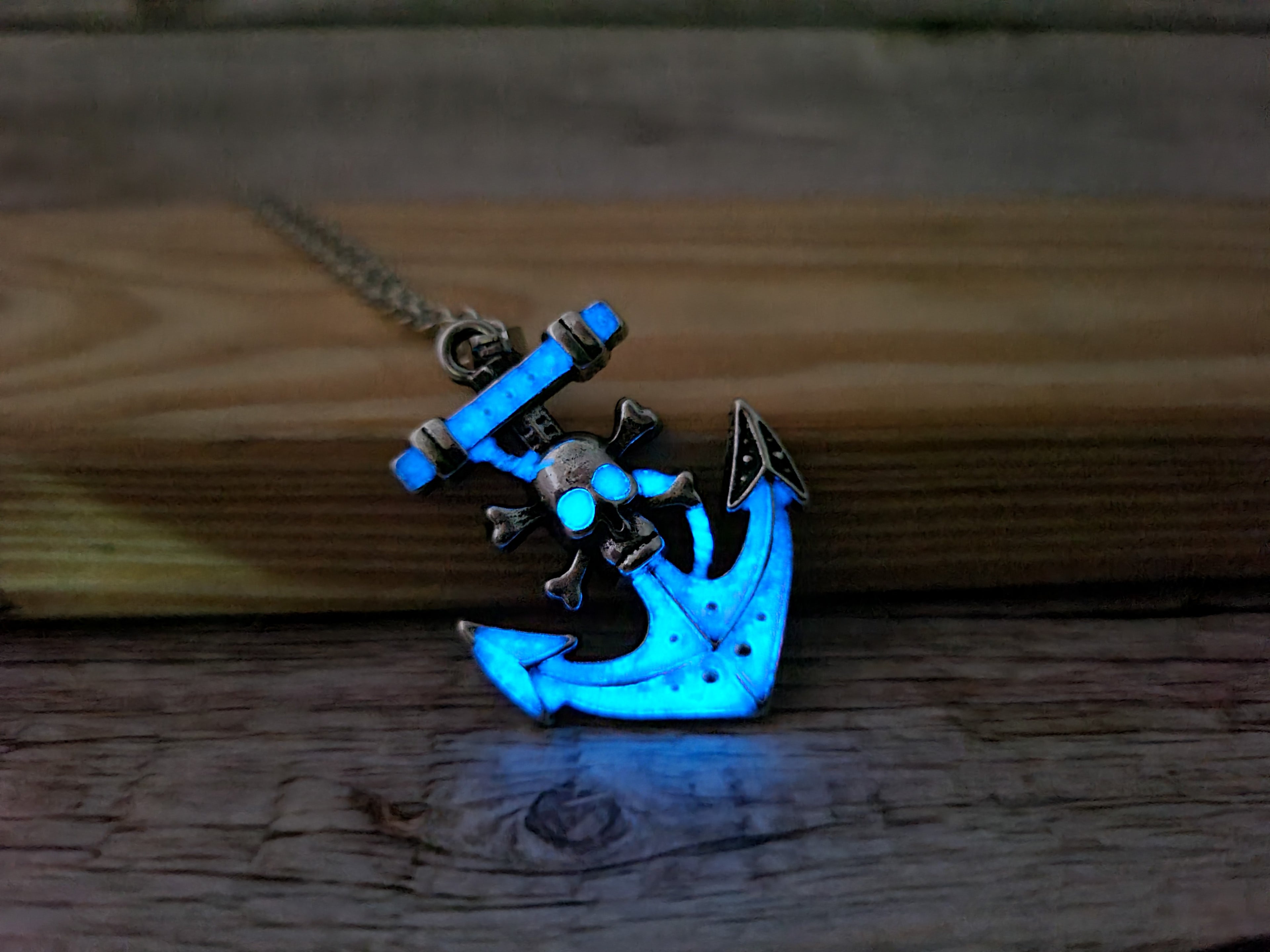 Anchor and skull glow-in-the-dark necklace Edgy maritime jewelry Glow pendant with anchor and skull design Unique nautical accessory Skull - Pink Horse Florida