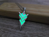 Glow-in-the-dark arrow necklace Luminescent arrow pendant Glowing arrow jewelry Enchanting glow necklace Arrow design with glow Nighttime accessory Directional charm Glow pendant with arrow motif - Pink Horse Florida