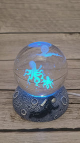 Crystal ball night light Decorative lighting Ambient illumination Tranquil glow Enchanting ambiance Mystical decor Soft illumination